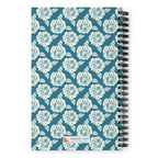 Meadow spiral notebook in Dew, repeating cream roses on steel blue, back cover with kdspain.com label – Kate Spain design