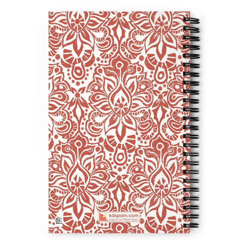 Earth spiral notebook in Clay, clay-red block-print medallions on cream, back cover with kdspain.com label – Kate Spain design