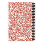 Earth spiral notebook in Clay, clay-red block-print medallions on cream, back cover with kdspain.com label – Kate Spain design