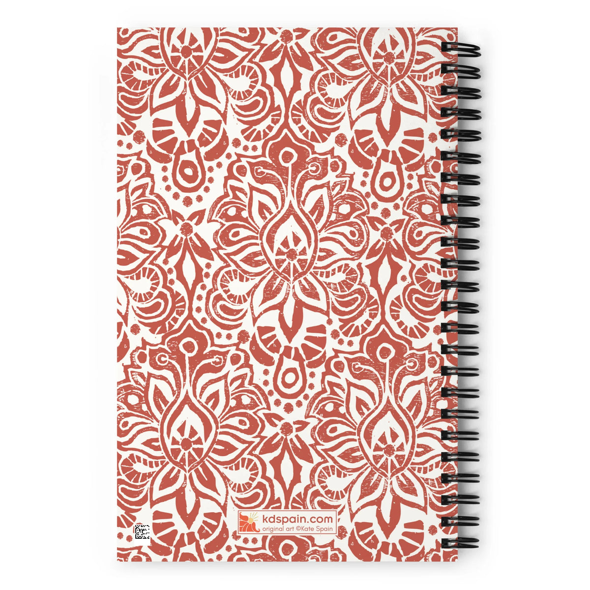 Earth spiral notebook in Clay, clay-red block-print medallions on cream, back cover with kdspain.com label – Kate Spain design