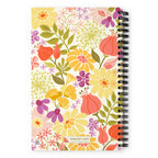 North Meadow spiral notebook with yellow, coral and mauve garden flowers with olive leaves on cream, back cover with kdspain.com label – Kate Spain design
