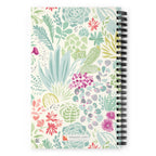 Desert spiral notebook with pale green succulents and cacti with coral and magenta blooms on cream, back cover with kdspain.com label – Kate Spain design