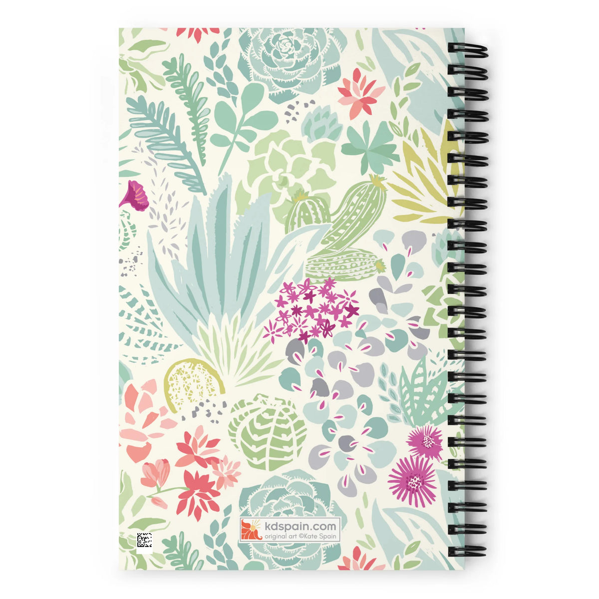 Desert spiral notebook with pale green succulents and cacti with coral and magenta blooms on cream, back cover with kdspain.com label – Kate Spain design