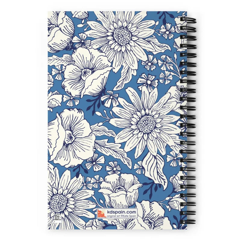Jardin Blue spiral notebook with white line-drawn florals on cornflower blue, back cover with kdspain.com label – Kate Spain design