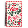 Sew Merry + Bright spiral notebook with quilt-block stars and holly, front cover – Kate Spain design for Pat Sloan