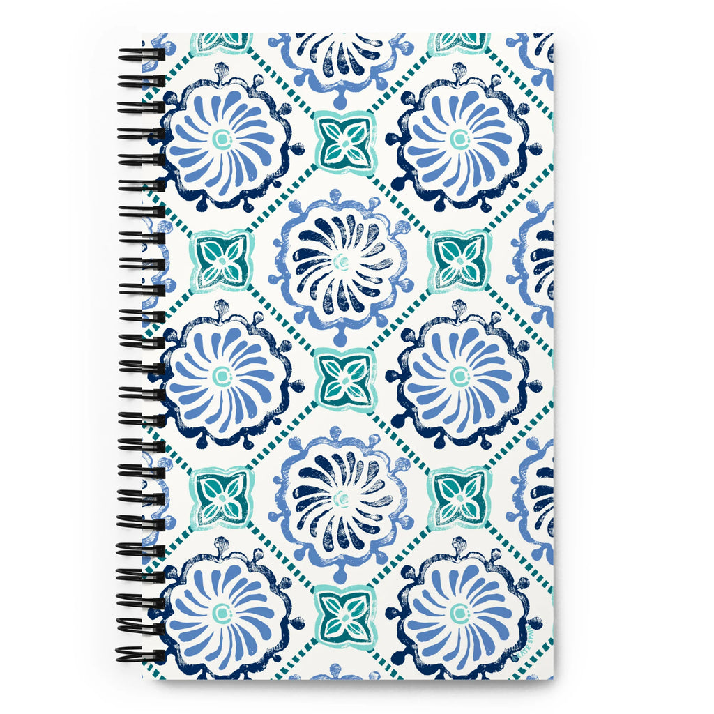 Horizon Tile spiral notebook with blue and teal pinwheel tile medallions on cream, front cover – Kate Spain design