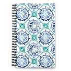 Horizon Tile spiral notebook with blue and teal pinwheel tile medallions on cream, front cover – Kate Spain design