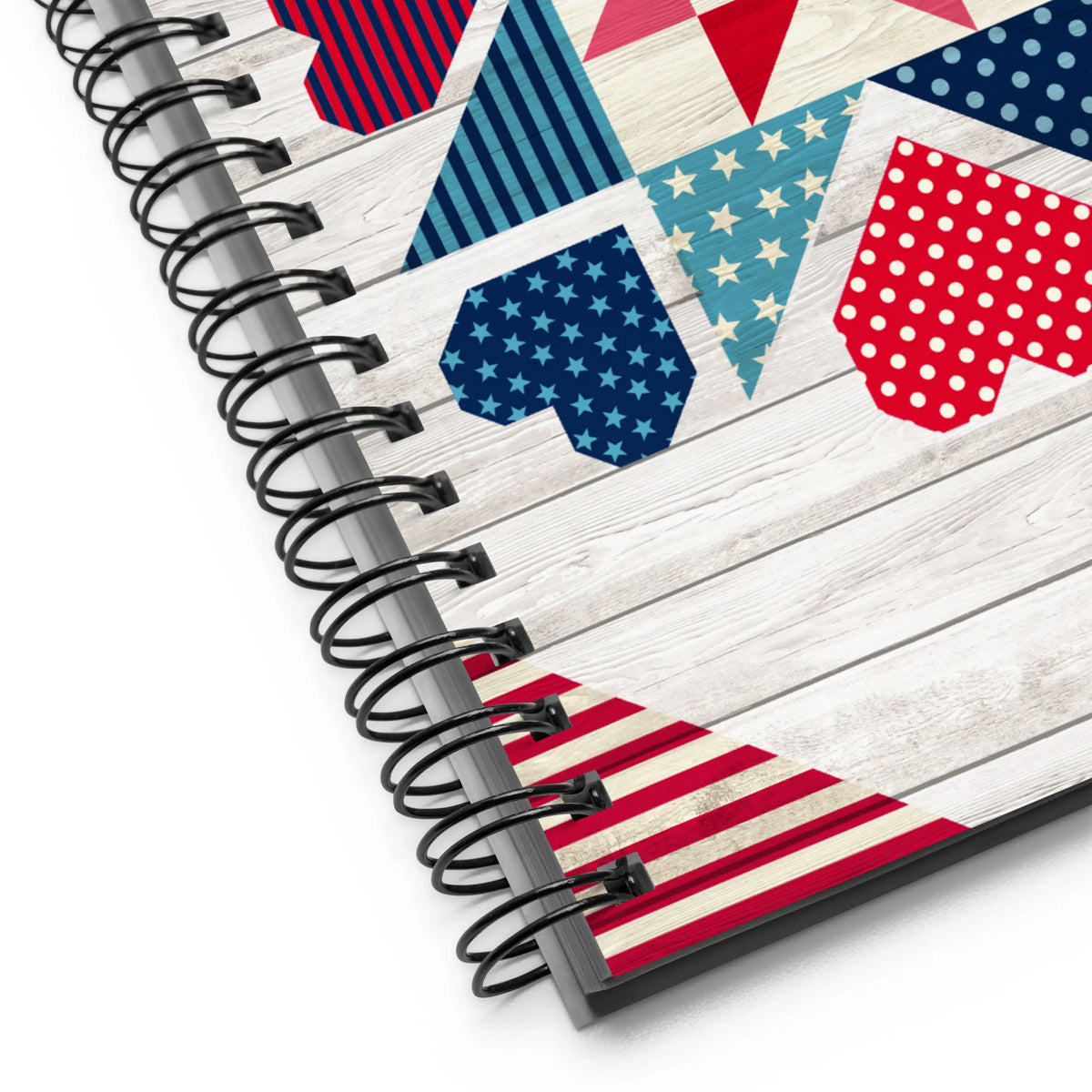 Liberty Love spiral notebook with star quilt blocks and hearts, close-up of the spiral binding – Kate Spain design for Pat Sloan