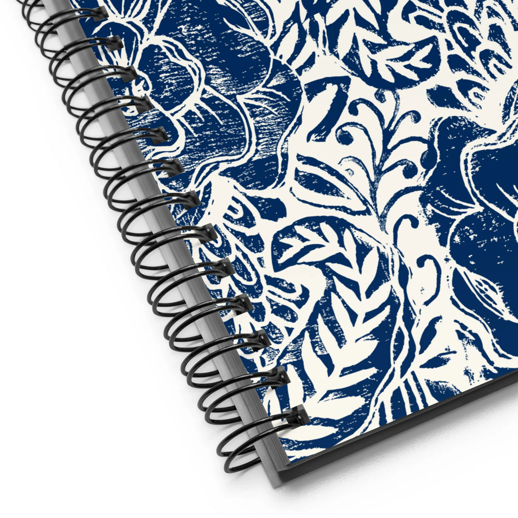 Flora spiral notebook with an indigo block-print garden of flowers and leaves, close-up of the spiral binding – Kate Spain design