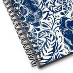 Flora spiral notebook with an indigo block-print garden of flowers and leaves, close-up of the spiral binding – Kate Spain design