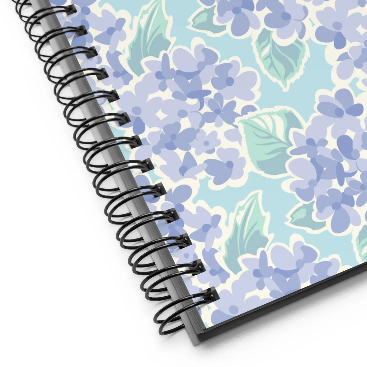 Nantucket Hydrangea spiral notebook with soft lavender-blue hydrangeas and mint leaves on pale aqua, close-up of the spiral binding – Kate Spain design