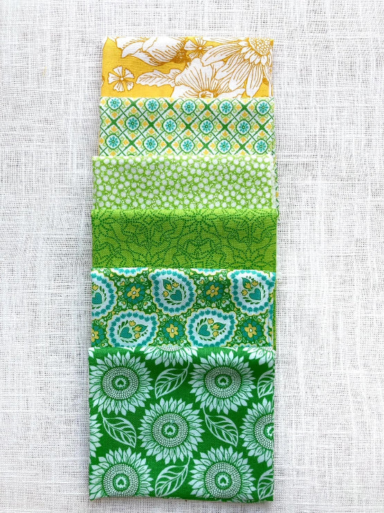 Sunflower Fields bundle of six Moda fat quarters in yellow and green prints from the Sunflowers in My Heart fabric collection by Kate Spain