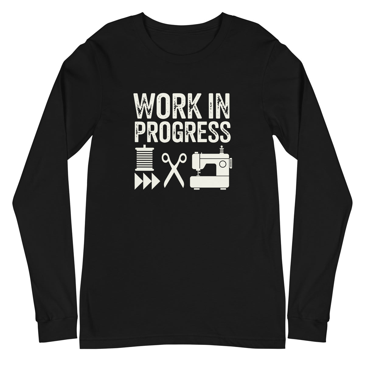 Work in Progress lettering with spool, scissors and sewing machine icons on a unisex long-sleeve tee in black, front view – Kate Spain design for Pat Sloan