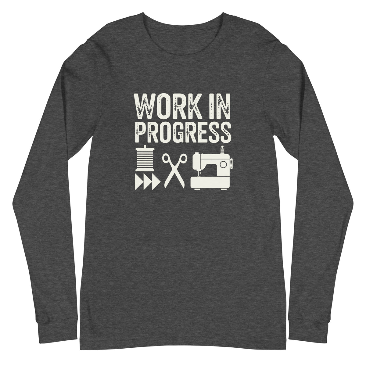 Work in Progress lettering with spool, scissors and sewing machine icons on a unisex long-sleeve tee in dark grey heather, front view – Kate Spain design for Pat Sloan