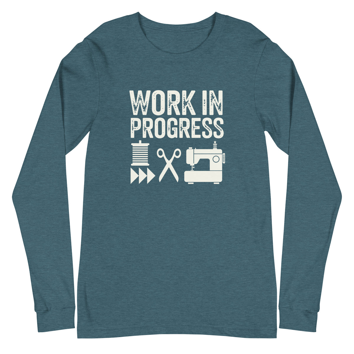Work in Progress lettering with spool, scissors and sewing machine icons on a unisex long-sleeve tee in heather deep teal, front view – Kate Spain design for Pat Sloan