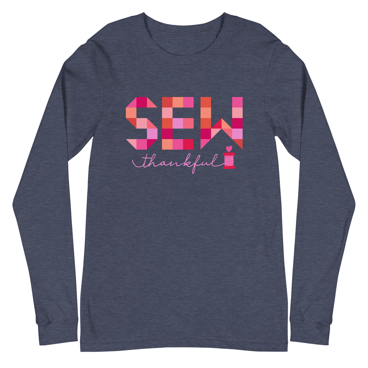 Sew Thankful patchwork lettering with a heart-topped thread spool on a unisex long-sleeve tee in heather navy, front view – Kate Spain design for Pat Sloan