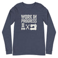 Work in Progress lettering with spool, scissors and sewing machine icons on a unisex long-sleeve tee in heather navy, front view – Kate Spain design for Pat Sloan
