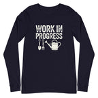 Garden Work in Progress distressed lettering with a shovel, pitchfork and watering can on a long sleeve t-shirt in navy, front view – Kate Spain design