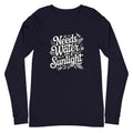 "Needs Water and Sunlight" hand-lettering with leaves and a dragonfly on a unisex long-sleeve tee in navy, front view – Kate Spain design