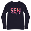 Sew Thankful patchwork lettering with a heart-topped thread spool on a unisex long-sleeve tee in navy, front view – Kate Spain design for Pat Sloan