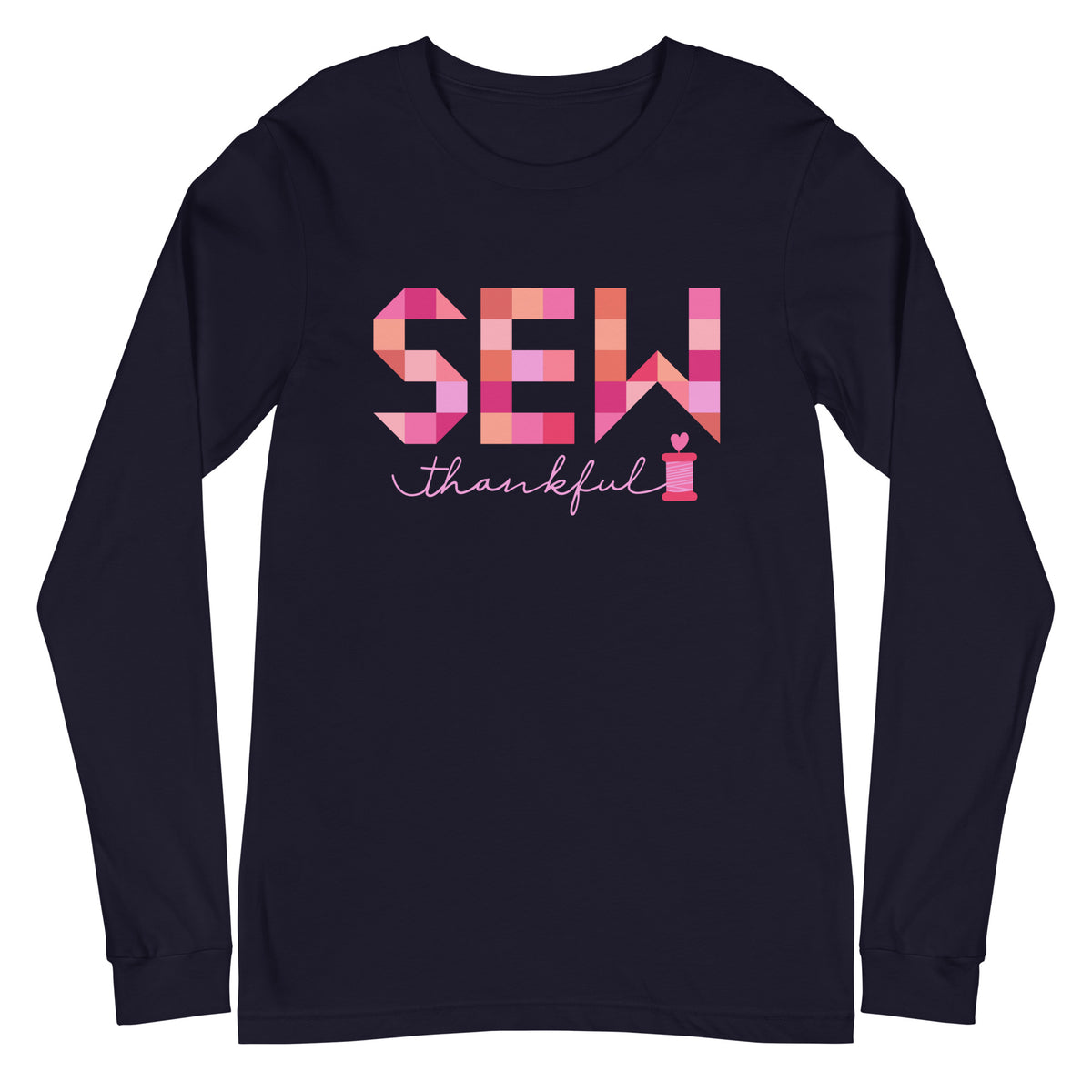 Sew Thankful patchwork lettering with a heart-topped thread spool on a unisex long-sleeve tee in navy, front view – Kate Spain design for Pat Sloan