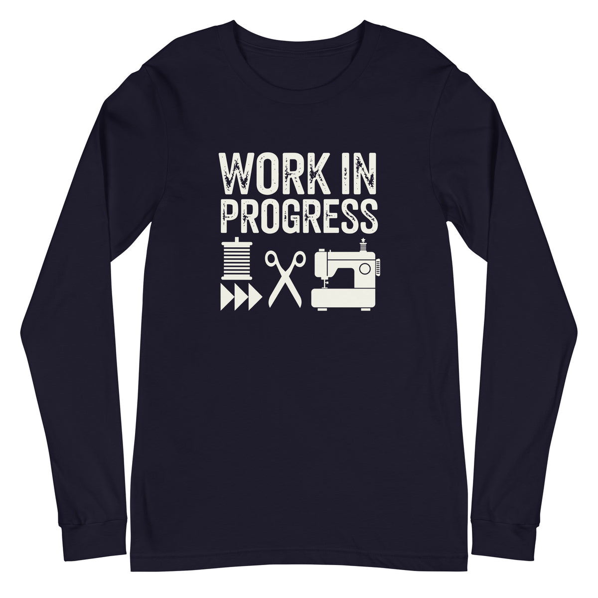 Work in Progress lettering with spool, scissors and sewing machine icons on a unisex long-sleeve tee in navy, front view – Kate Spain design for Pat Sloan