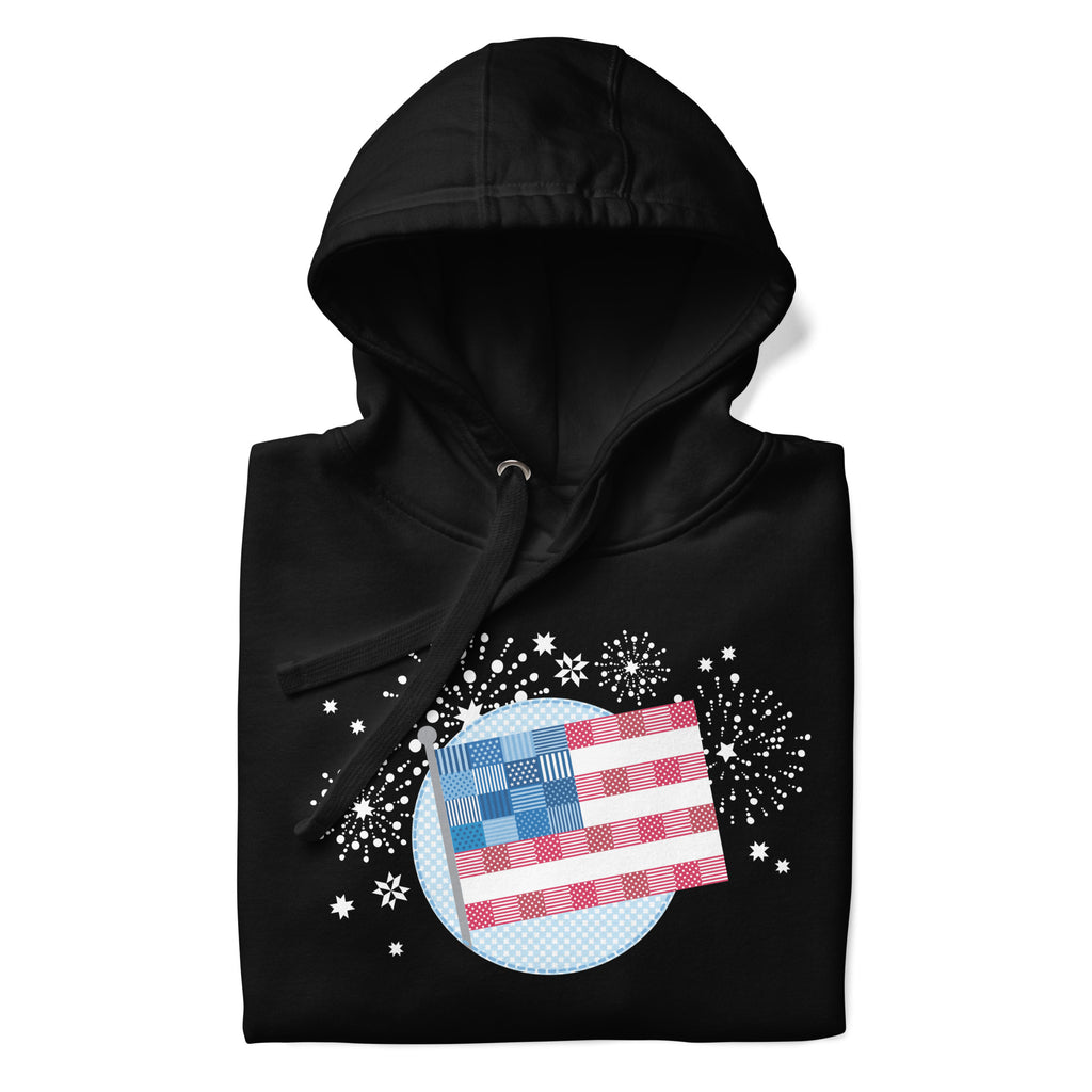 patchwork American flag in quilt fabrics on a pullover hoodie in black, folded close-up of the design – Kate Spain design for Pat Sloan