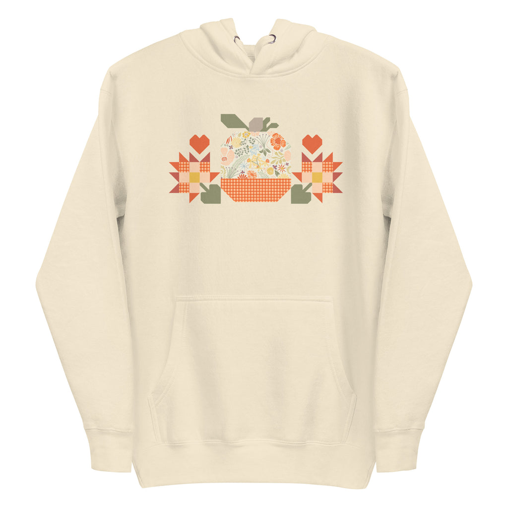 Falling for Fall patchwork pumpkin with quilt-block stars and hearts on a pullover hoodie in vintage white, front view – Kate Spain design for Pat Sloan