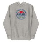 Fabric Curator Society of Stashers badge with a tomato pincushion on a pullover hoodie in athletic grey, front view – Kate Spain design for Pat Sloan