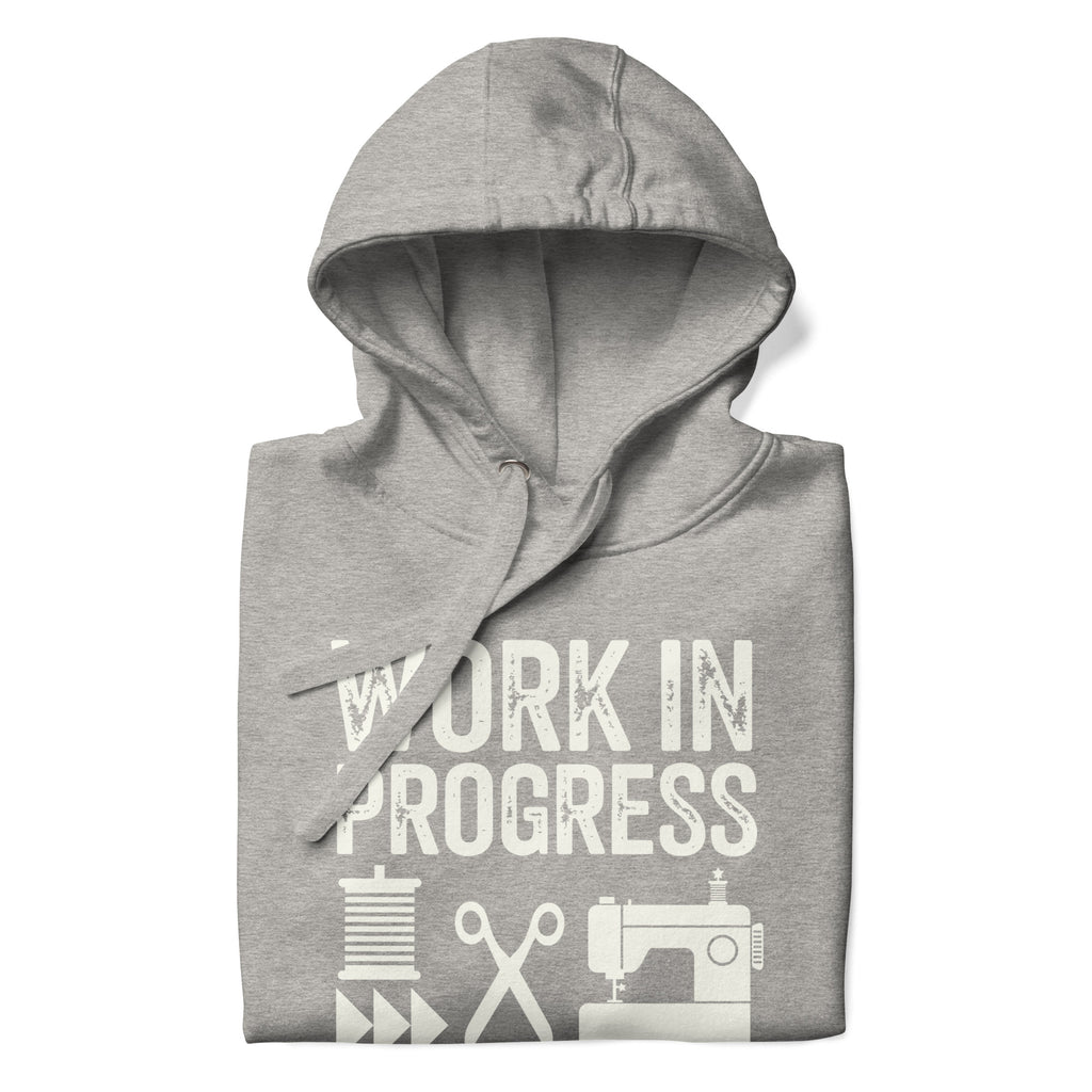 Work in Progress Mod distressed lettering with thread, scissors and sewing machine on a pullover hoodie in athletic grey, folded close-up of the design – Kate Spain design for Pat Sloan