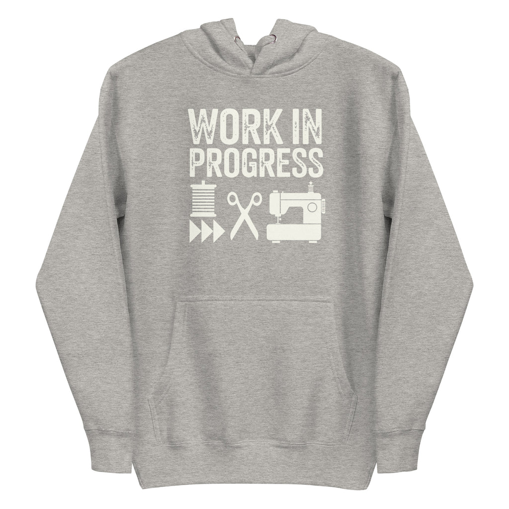 Work in Progress Mod distressed lettering with thread, scissors and sewing machine on a pullover hoodie in athletic grey, front view – Kate Spain design for Pat Sloan