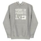 Work in Progress Mod distressed lettering with thread, scissors and sewing machine on a pullover hoodie in athletic grey, front view – Kate Spain design for Pat Sloan