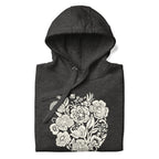 Meadowsweet woodblock-style bouquet of wildflowers on a pullover hoodie in charcoal grey, folded close-up of the design – Kate Spain design