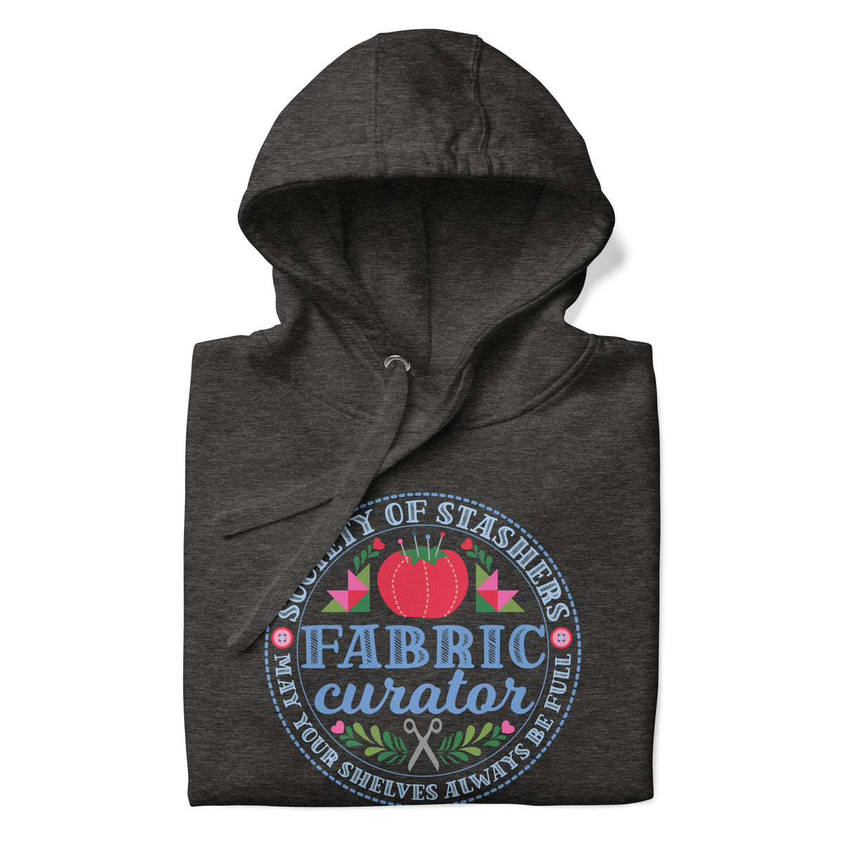 Fabric Curator Society of Stashers badge with a tomato pincushion on a pullover hoodie in charcoal grey, folded close-up of the design – Kate Spain design for Pat Sloan