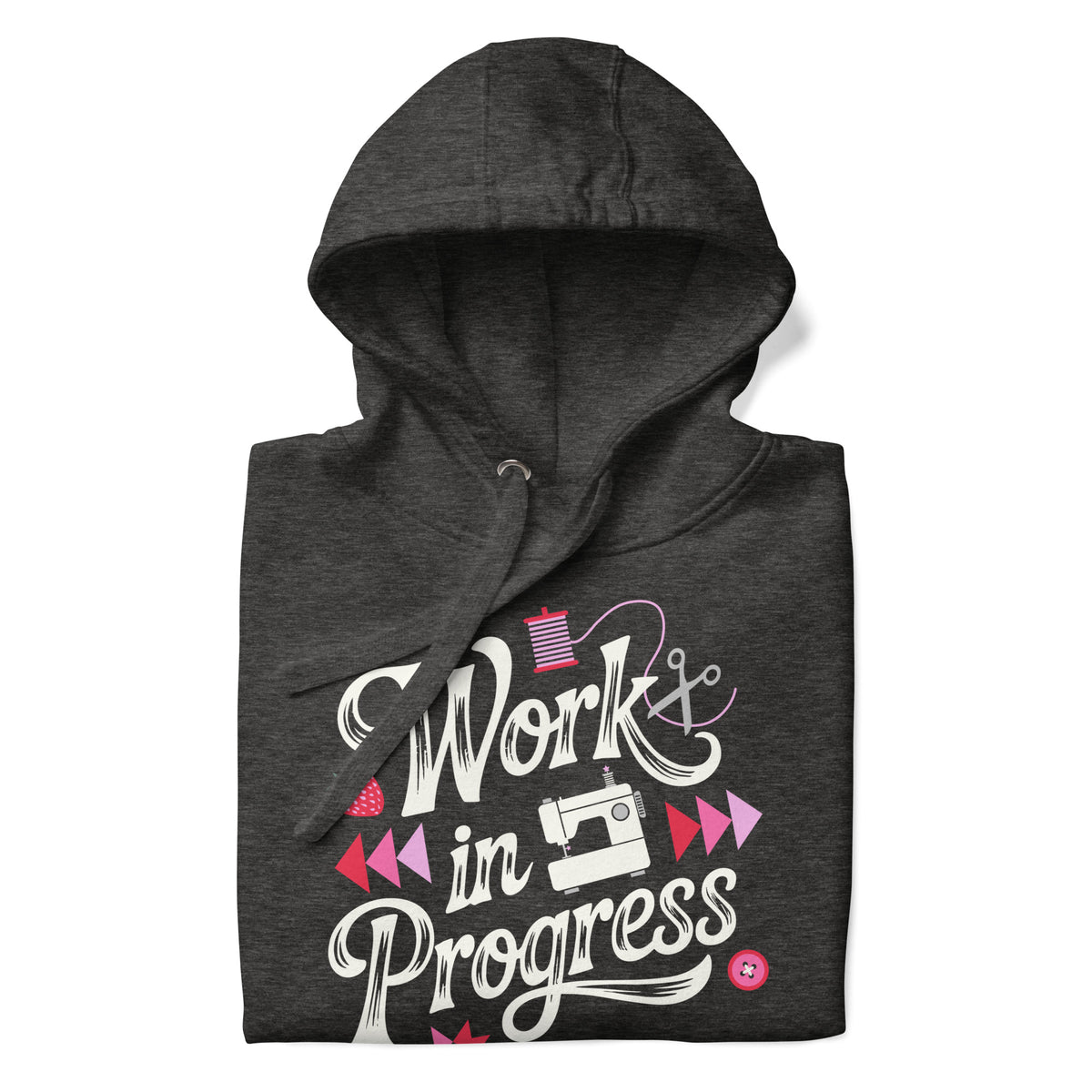 Work in Progress sewing design with flying geese, sewing machine, strawberry and thread spool on a pullover hoodie in charcoal grey, folded close-up of the design – Kate Spain design for Pat Sloan