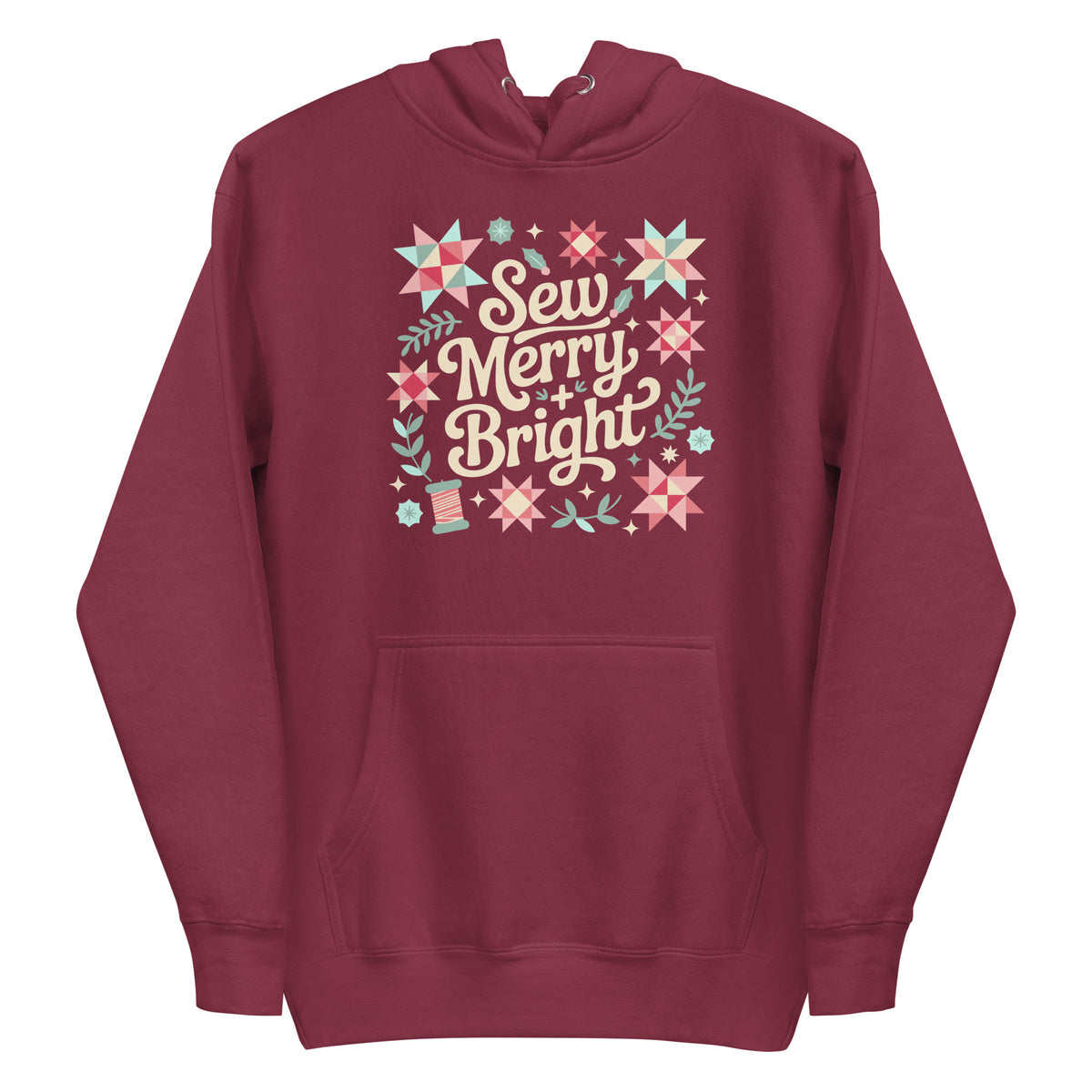 Sew Merry + Bright lettering with quilt-block stars, holly and a thread spool on a pullover hoodie in maroon, front view – Kate Spain design for Pat Sloan