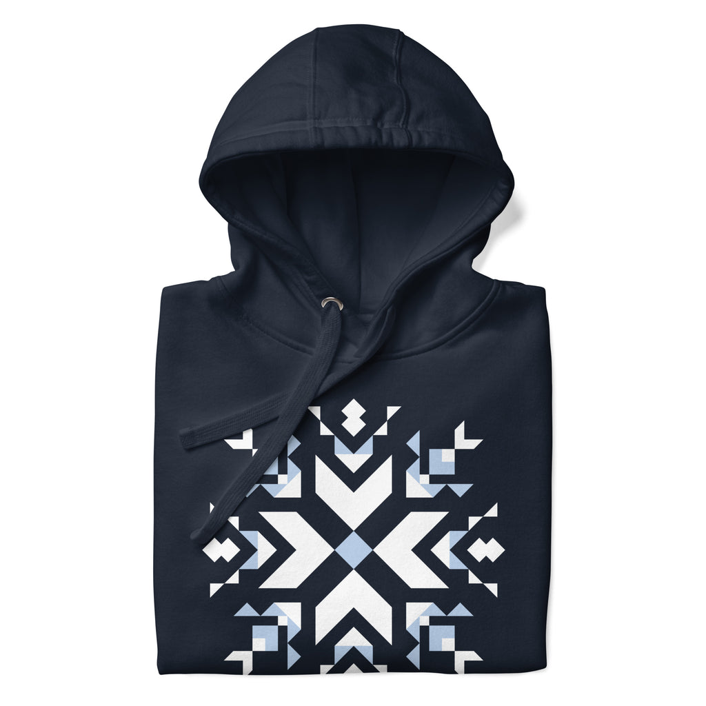 Let It Snow snowflake quilt block on a pullover hoodie in navy, folded close-up of the design – Kate Spain design for Pat Sloan