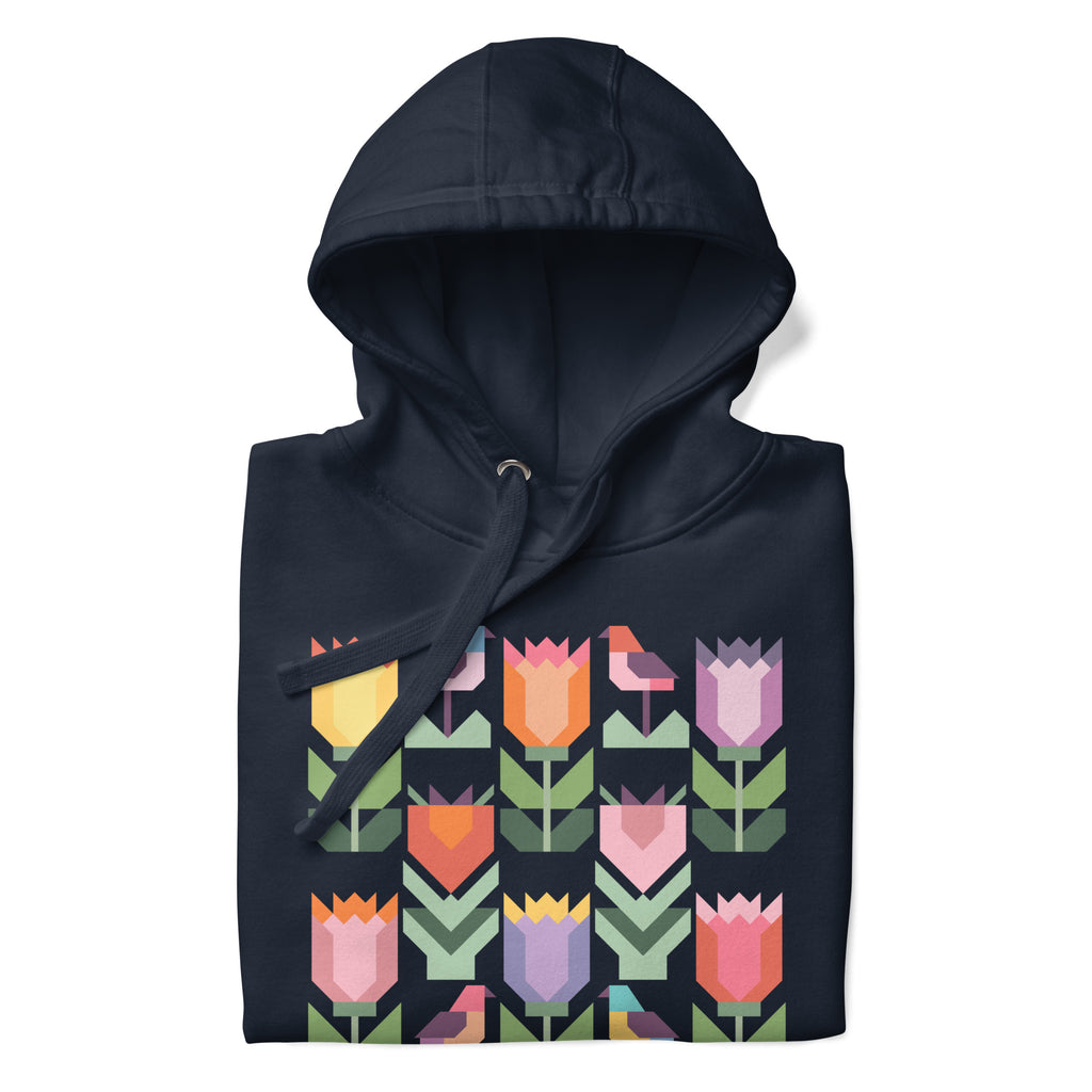 Birds + Blooms patchwork tulips and birds on a pullover hoodie in navy, folded close-up of the design – Kate Spain design for Pat Sloan