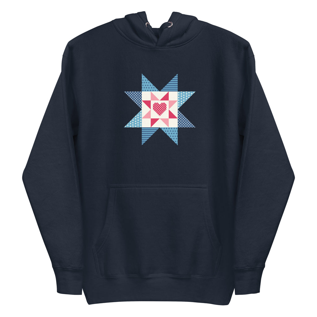 Liberty Love star quilt block with a heart in red, white and blue on a pullover hoodie in navy, front view – Kate Spain design for Pat Sloan