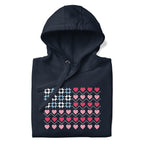 United We Quilt patchwork flag with quilt-block stars and heart stripes on a pullover hoodie in navy, folded close-up of the design – Kate Spain design for Pat Sloan