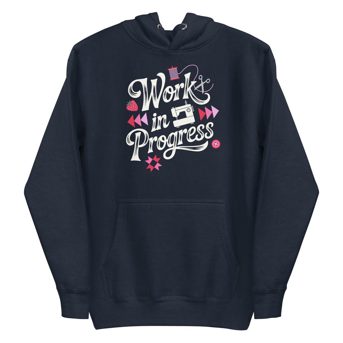 Work in Progress sewing design with flying geese, sewing machine, strawberry and thread spool on a pullover hoodie in navy, front view – Kate Spain design for Pat Sloan
