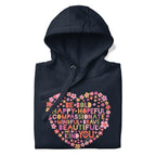 Be You floral heart of inspirational words on a premium hoodie in navy, folded close-up of the design – Kate Spain design