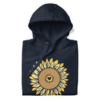 Golden sunflower with a heart center on a pullover hoodie in heather navy, folded close-up of the design – Sunflowers in My Heart by Kate Spain