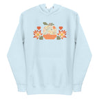 Falling for Fall patchwork pumpkin with quilt-block stars and hearts on a pullover hoodie in sky blue, front view – Kate Spain design for Pat Sloan