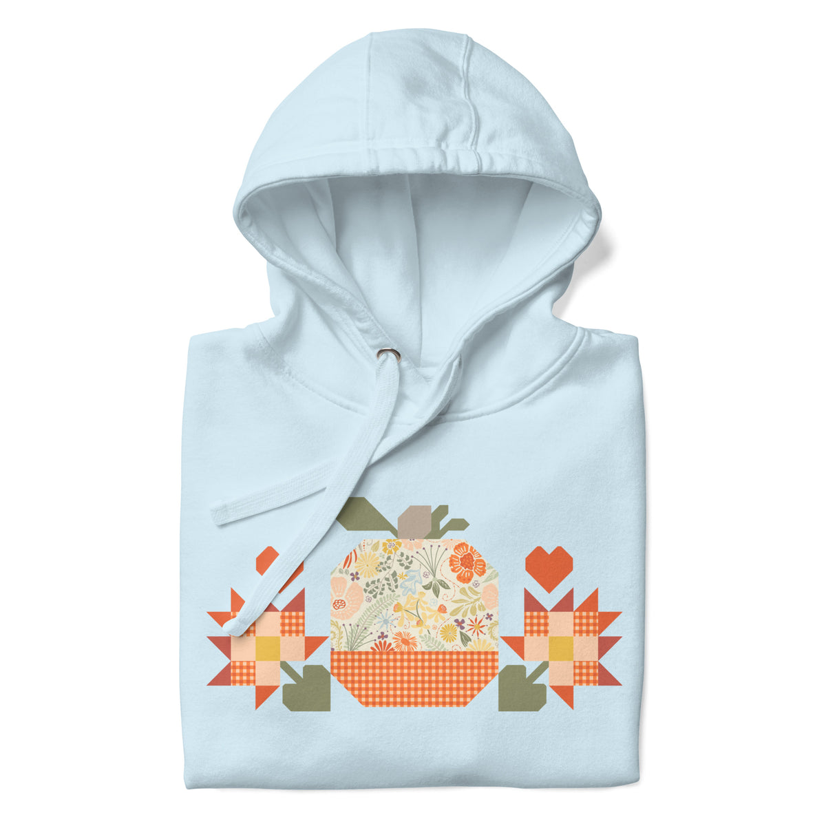 Falling for Fall patchwork pumpkin with quilt-block stars and hearts on a pullover hoodie in sky blue, folded close-up of the design – Kate Spain design for Pat Sloan
