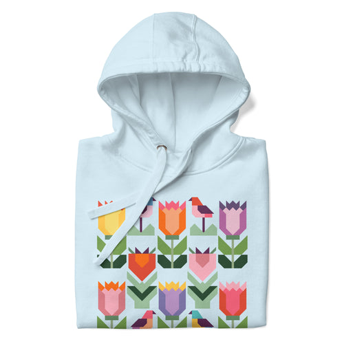 Birds + Blooms patchwork tulips and birds on a pullover hoodie in sky blue, folded close-up of the design – Kate Spain design for Pat Sloan