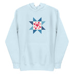 Liberty Love star quilt block with a heart in red, white and blue on a pullover hoodie in sky blue, front view – Kate Spain design for Pat Sloan