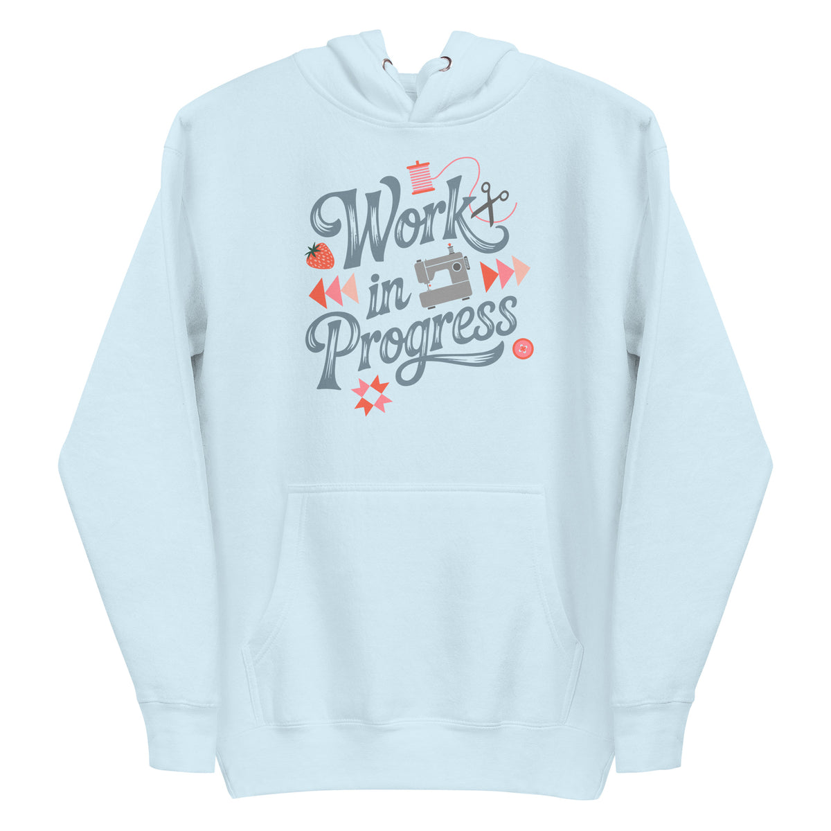 Work in Progress sewing design with flying geese, sewing machine, strawberry and thread spool on a pullover hoodie in sky blue, front view – Kate Spain design for Pat Sloan