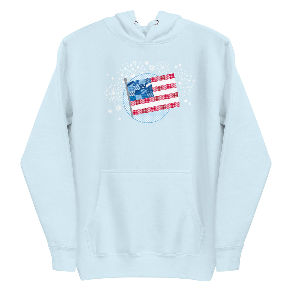 patchwork American flag in quilt fabrics on a pullover hoodie in sky blue, front view – Kate Spain design for Pat Sloan