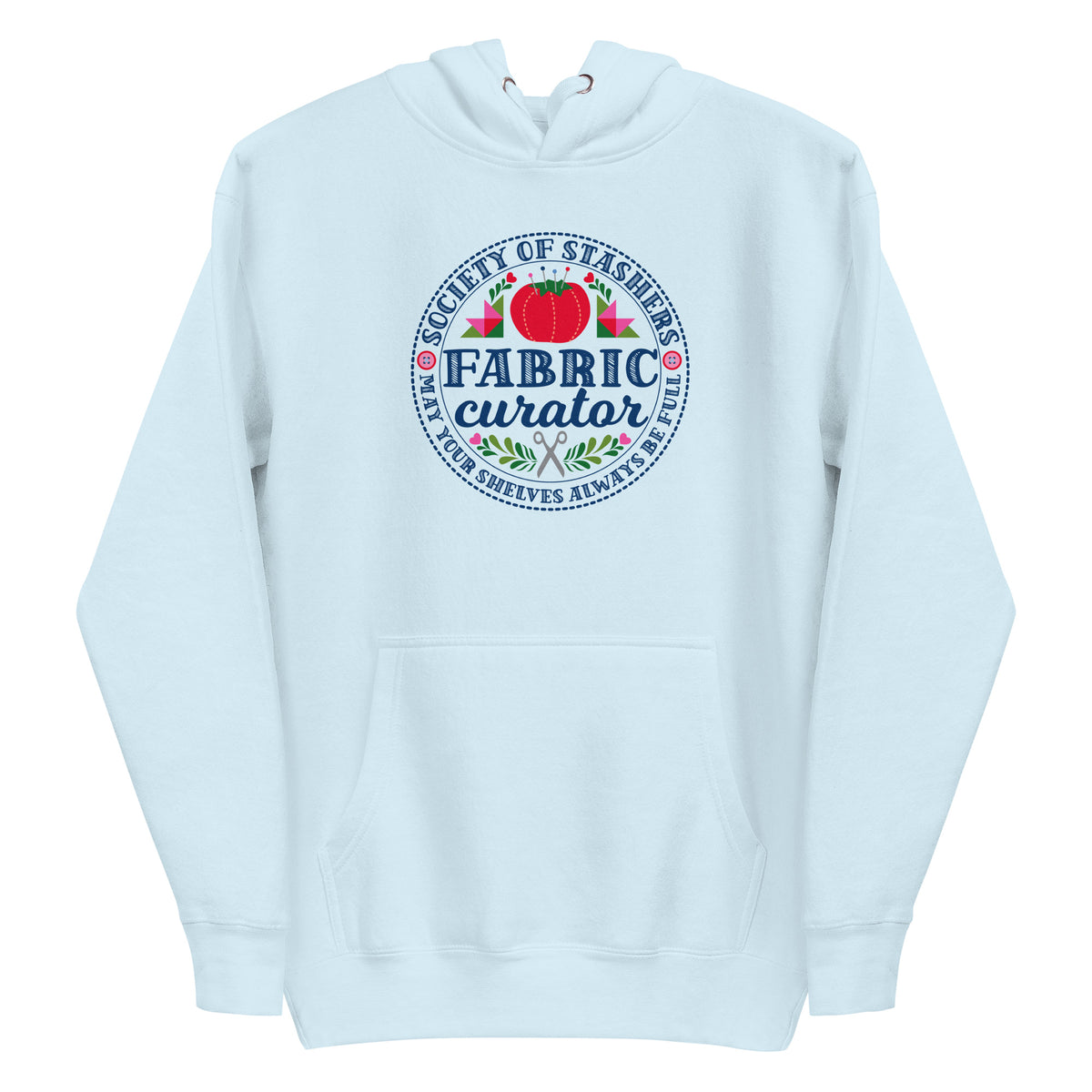 Fabric Curator Society of Stashers badge with a tomato pincushion on a pullover hoodie in sky blue, front view – Kate Spain design for Pat Sloan